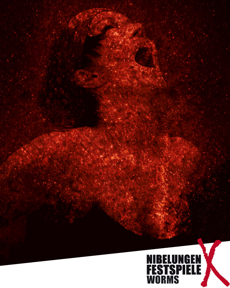 Ein dramatisches, rot getöntes Bild einer Person mit nach hinten geneigtem Kopf und offenem Mund, die zu schreien oder zu singen scheint, wobei strukturierte Partikel die Figur überlagern. Unten steht „Volblut Nibelungen Festspiele Worms“.